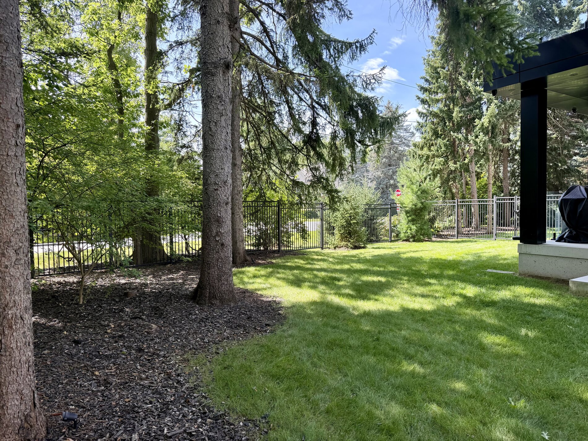 1654 Birchwood Drive — completed metal-fenced privacy yard