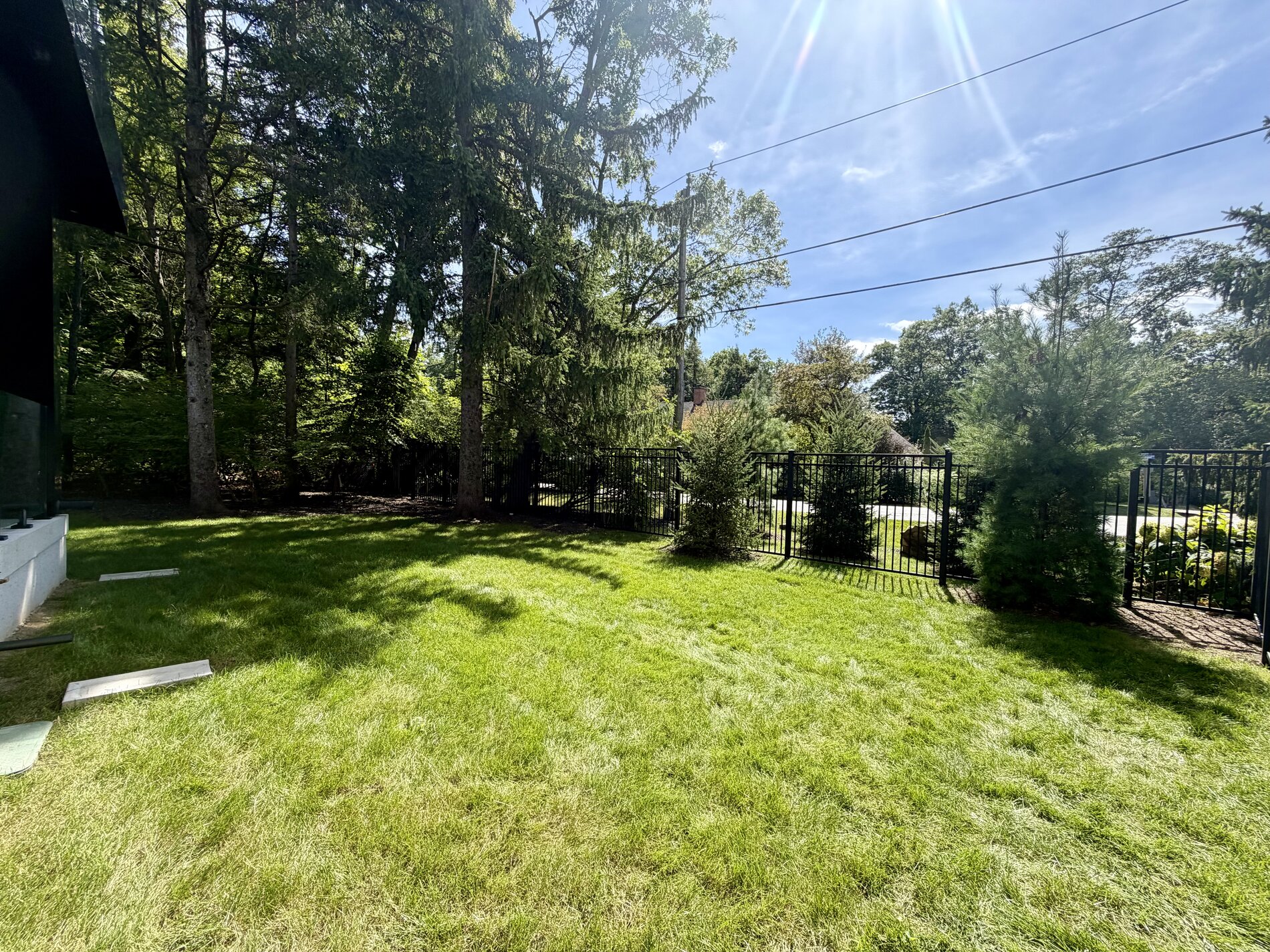 1654 Birchwood Drive — completed metal-fenced privacy yard